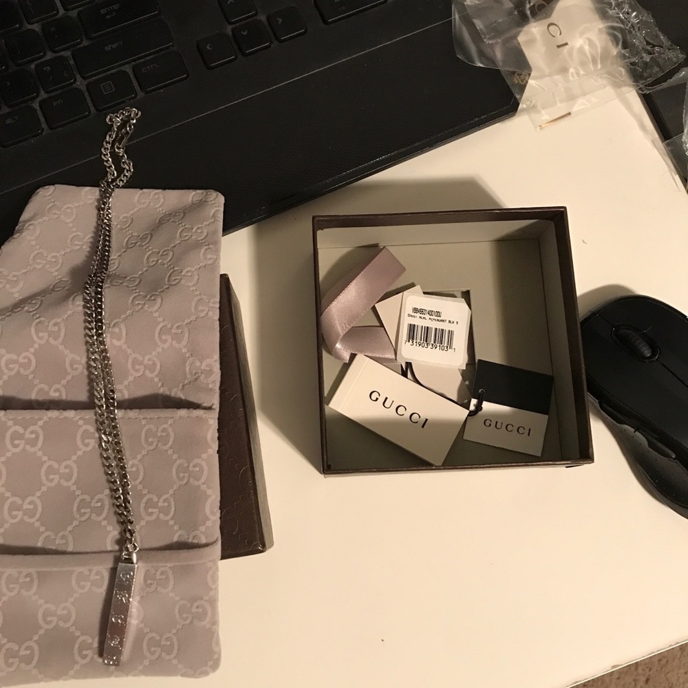Gucci ghost motif chain